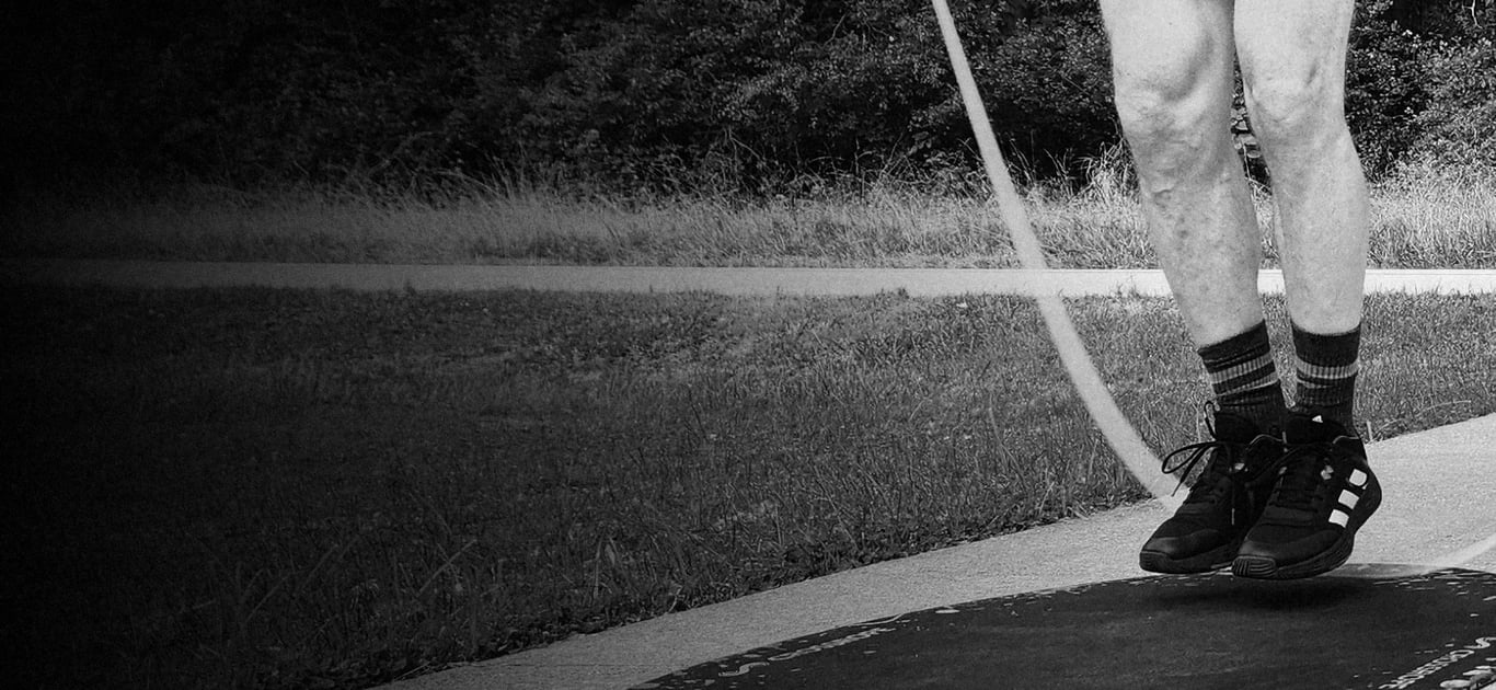 Todd Jones jumping rope outdoors.