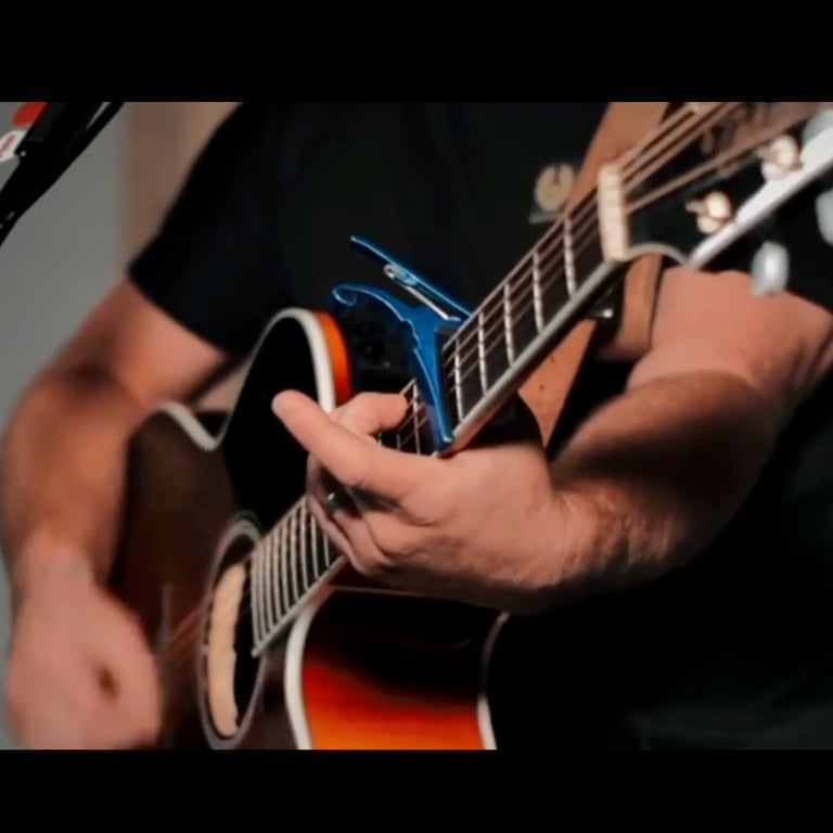 Brian - Singer & Guitar performing live