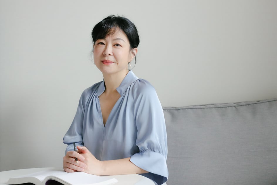 Wen-Chi at her desk