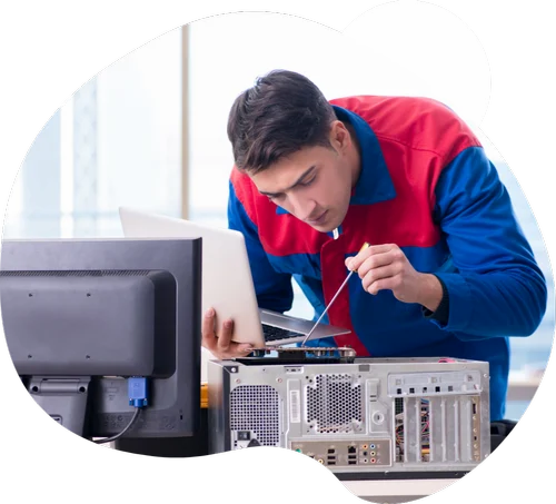 Close-up of laptop components during repair process with specialized tools and diagnostic equipment