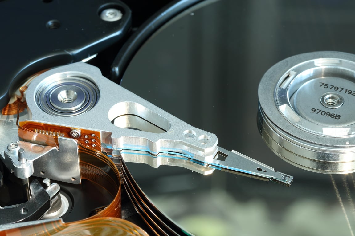 Technician recovering data from a damaged hard drive in a clean room environment at Metro Data Recovery Thane