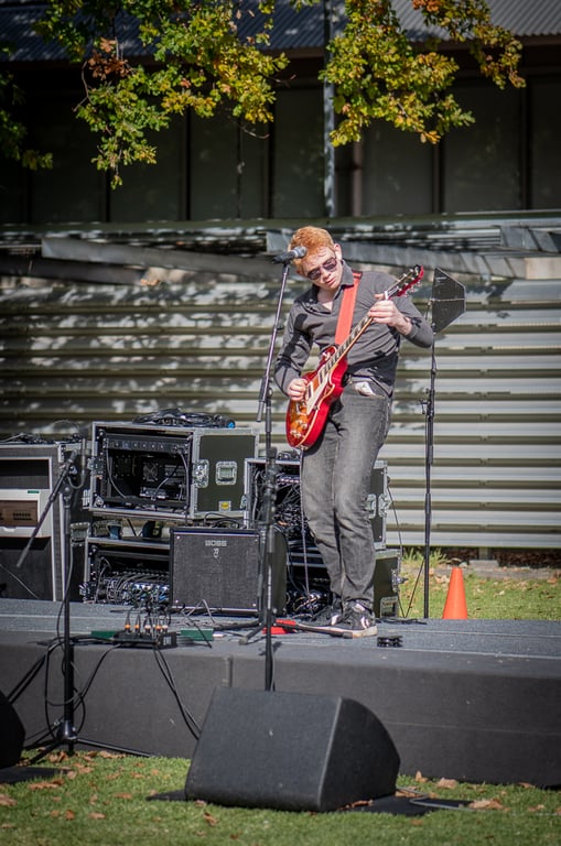 Ashton Jude backstage preparation before major concert performance