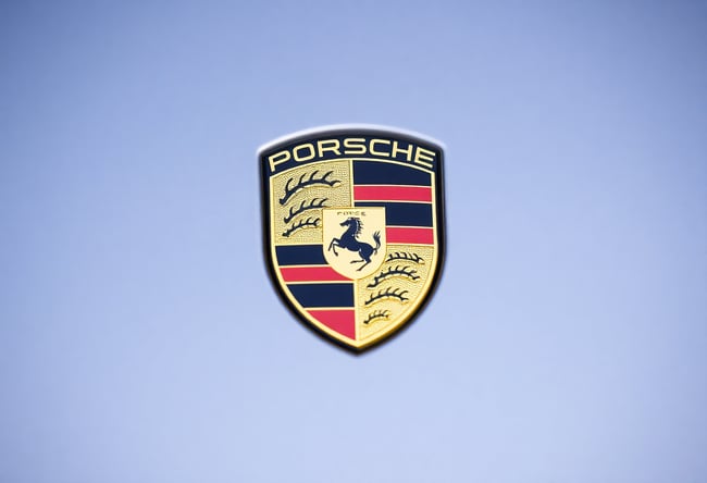 Elegant Porsche Emblem in Black and Gold