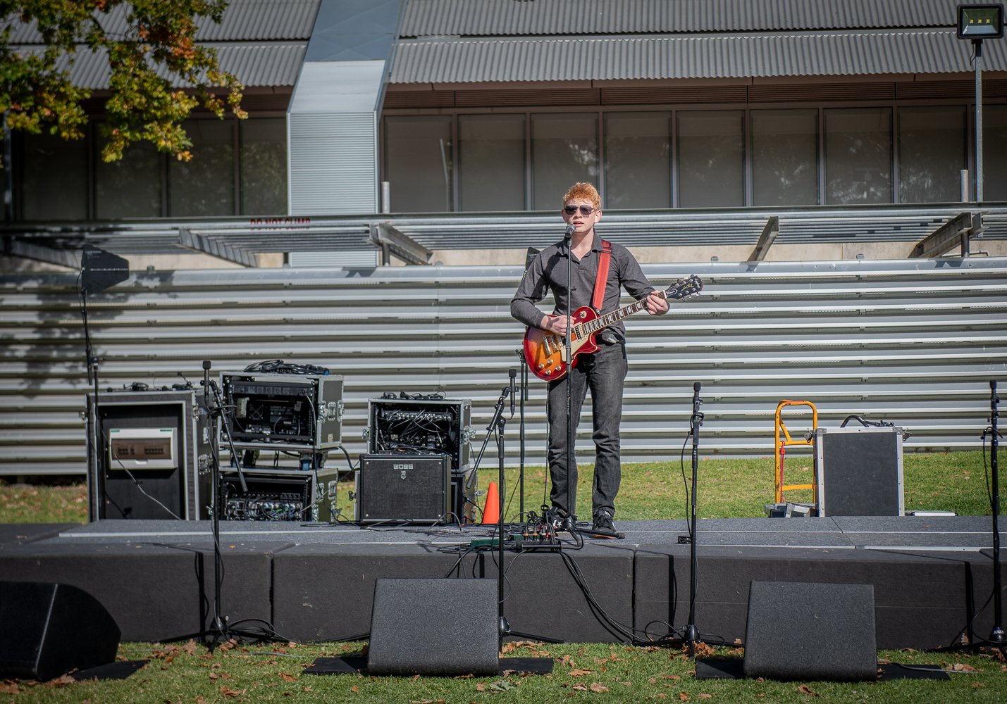 Ashton Jude in recording studio with headphones and microphone