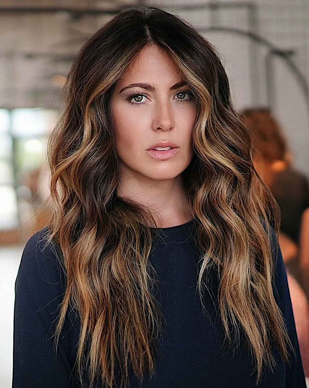 the image shows, girl wolf haircut with beachy waves