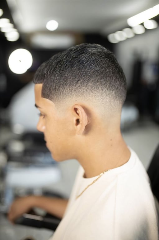 the image shows, taper fade haircut short