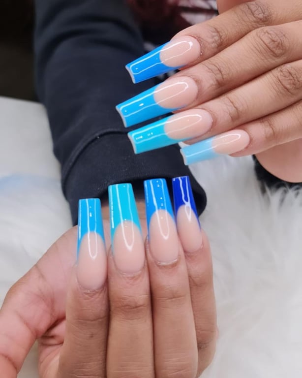 In this image show, Blue Ombre nails design