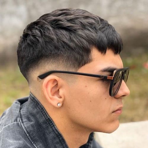 the image shows, Low taper fade edgar haircut