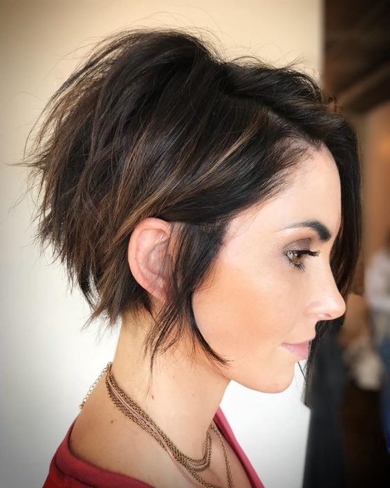 In this image show, the short ear length highlighted Messy Pixie
