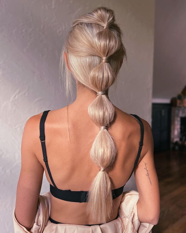 In this image show, the Bubble Ponytail for a Unique Look