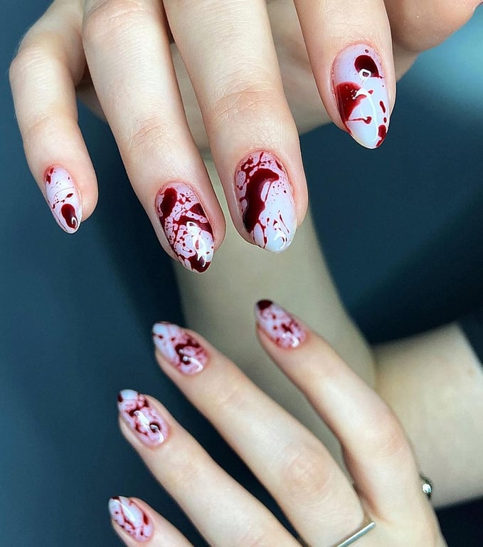 This image show, the blood red color splatter halloweennails design