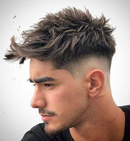 the image shows, low taper fade haircut