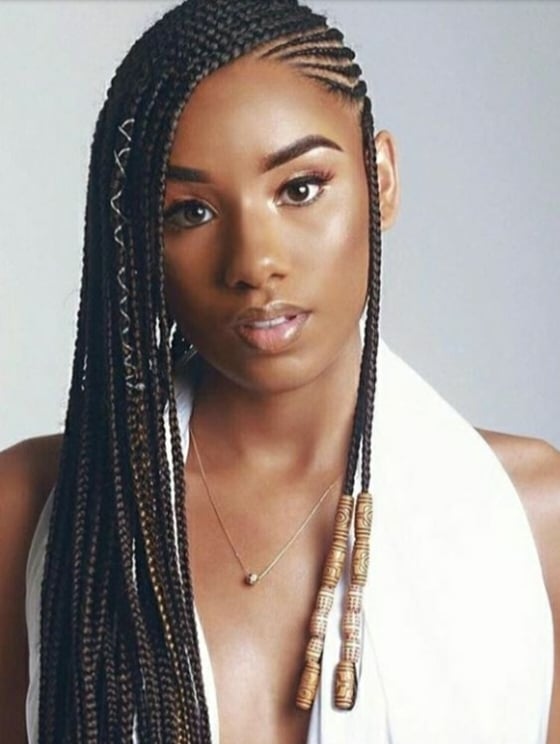 In this image show Side Swept Beaded Box Braids