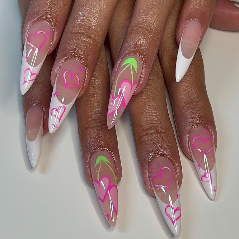 In this image show, the cute white and pink color heart shape nails design for valentines day.