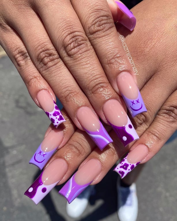 In this image show, the long coffine purple shape nails design.
