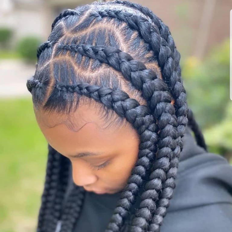 In this image show, the Four Cornrows hairstyles.