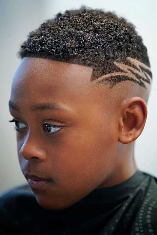 In this image show Black Boy Fade Haircuts With Designs