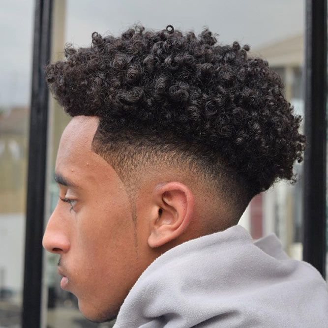 the image shows, Curly drop fade black men