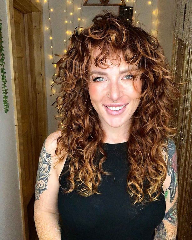 In this image show Razored Cut On Curly Wolf Hair