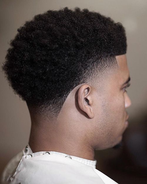 the image shows, low taper haircut black men