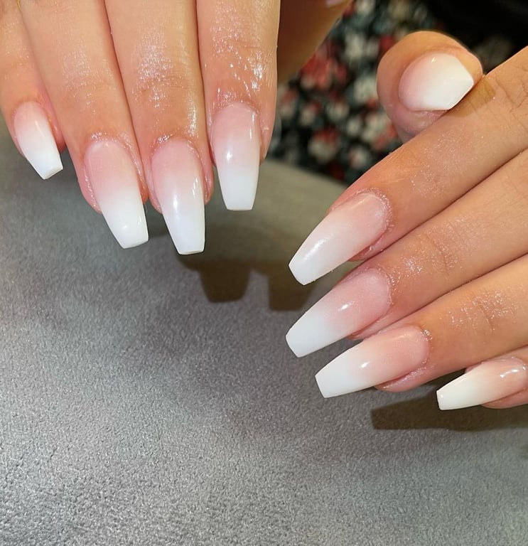 This image show, Pink and White ombre nails