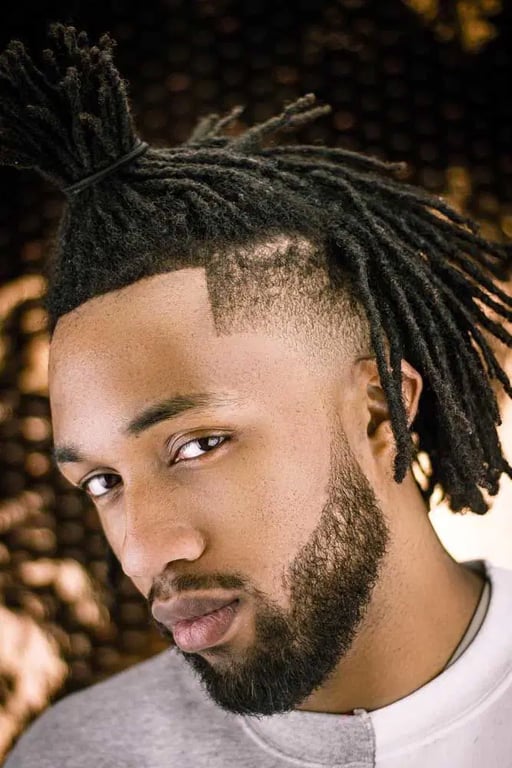 In this image show Mid Fade On Dreadlocks