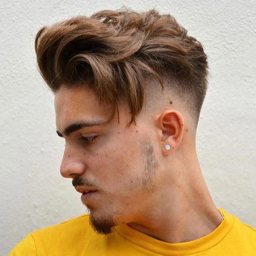 In this image show Long Hair Mid Fade Haircut