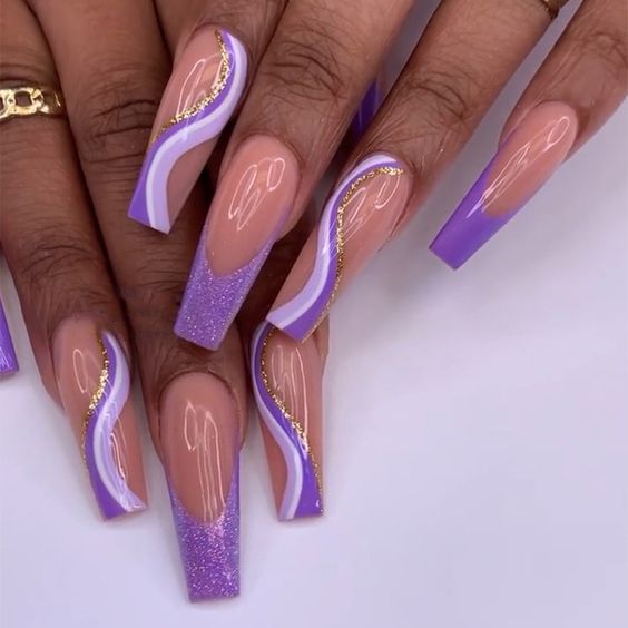 In this image show, the long lavender and peach color swling nails design.