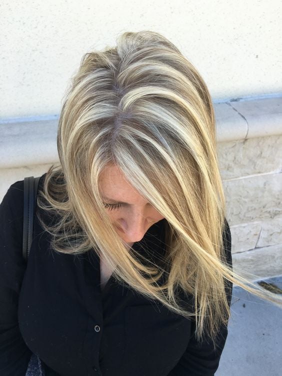 In this image show, the Subtle Dirty Blonde Angled Bob hairstyes.