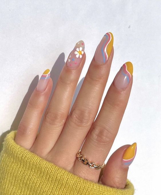 In this image show, the long cute abstract with this cute short flower nails design.