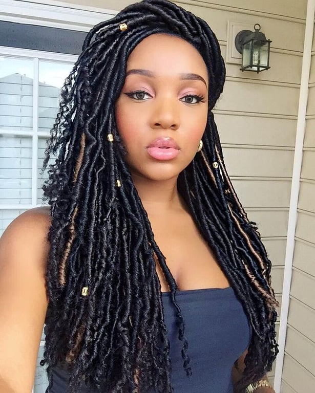 In this image show, the Crochet Braids for a Goddess Look hairstyle.