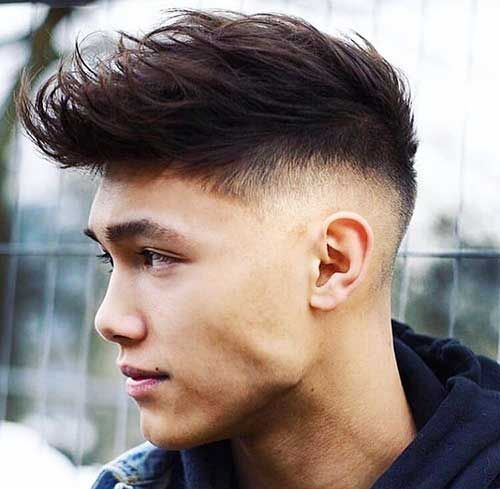 the image shows, Low drop fade messy top