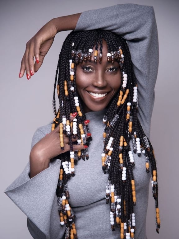 In this image show Box Braids with Fulani Beads 