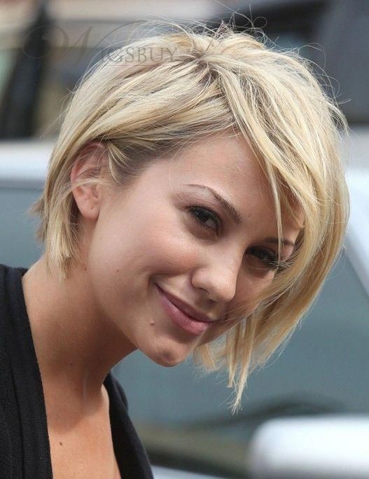 In this image show, the cool simple and trendy Grown Out Pixie Haircut.