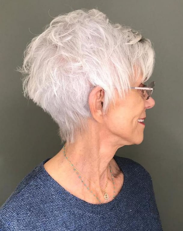 the image shows, Pixie Shag Haircut For Older Women