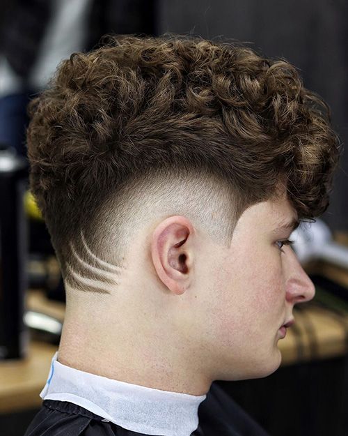 the image shows, Low Burst Fade Curly Hair