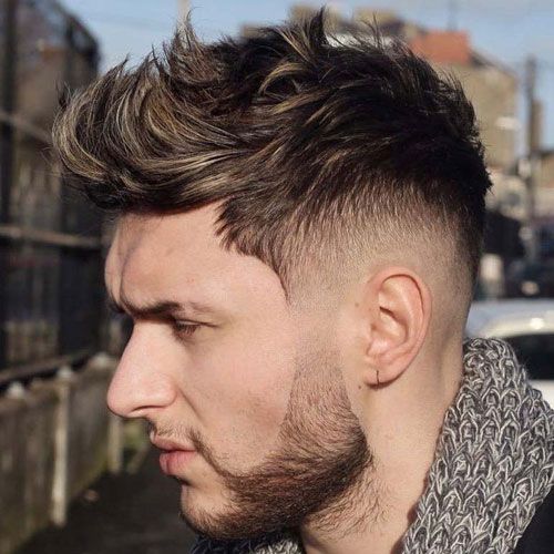 the image shows, mens fade haircut with beard