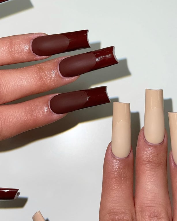 In this image show, the long cute chocolate and creamy color nails design.