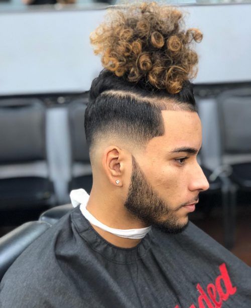 the image shows, Drop fade curly hair long