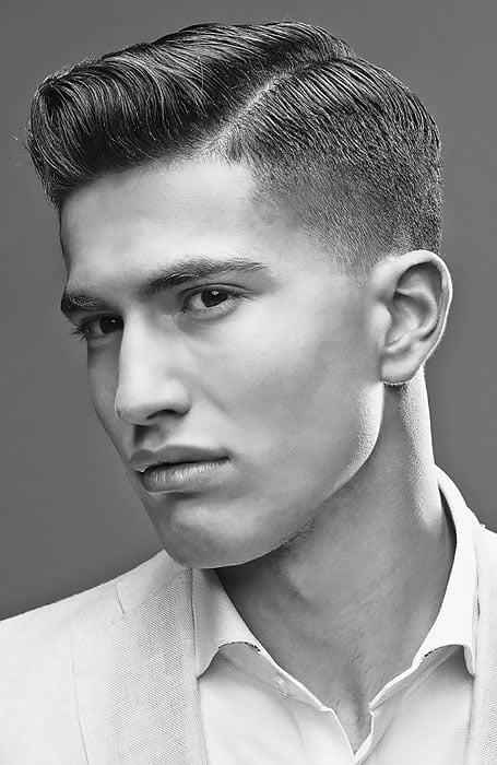the image shows, taper fade quiff