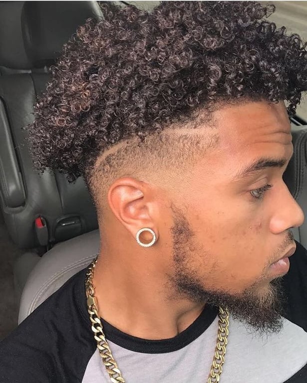 In this image show Curly Black Men's Taper Haircut 