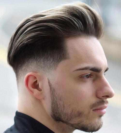the image shows, low skin taper fade