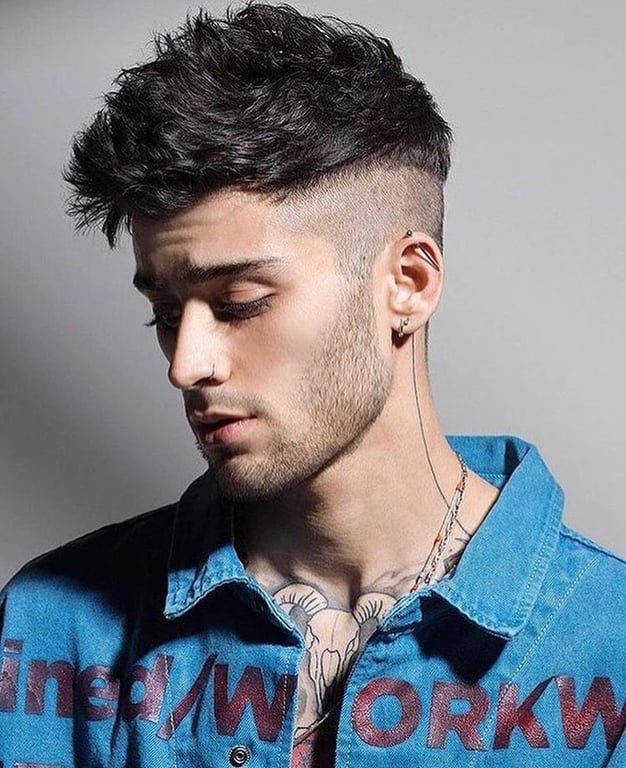 the image shows, zyan malik with spiked caesar haircut