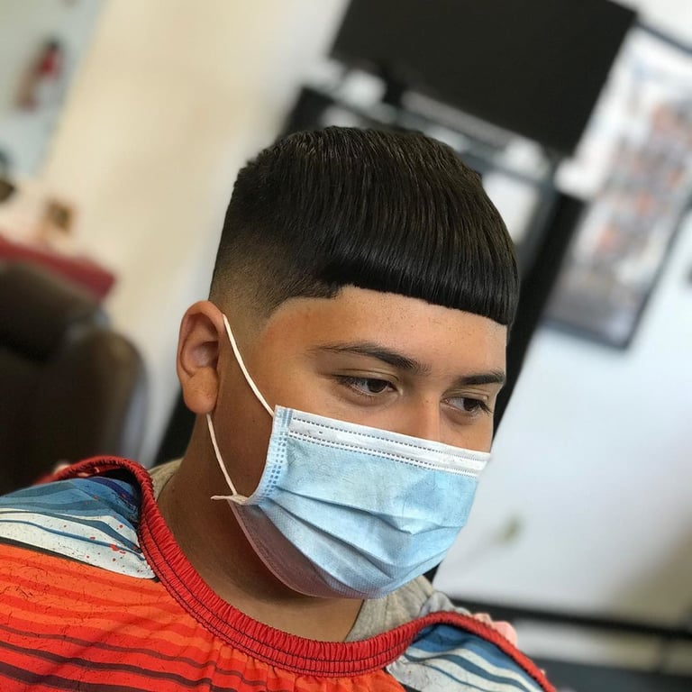 the image shows, mexican edgar haircut