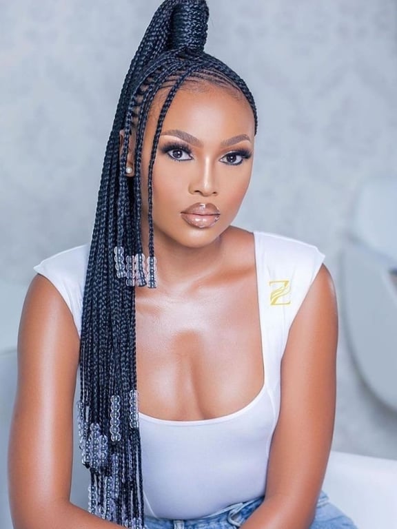 In this image show Beaded Braids on Side Bangs