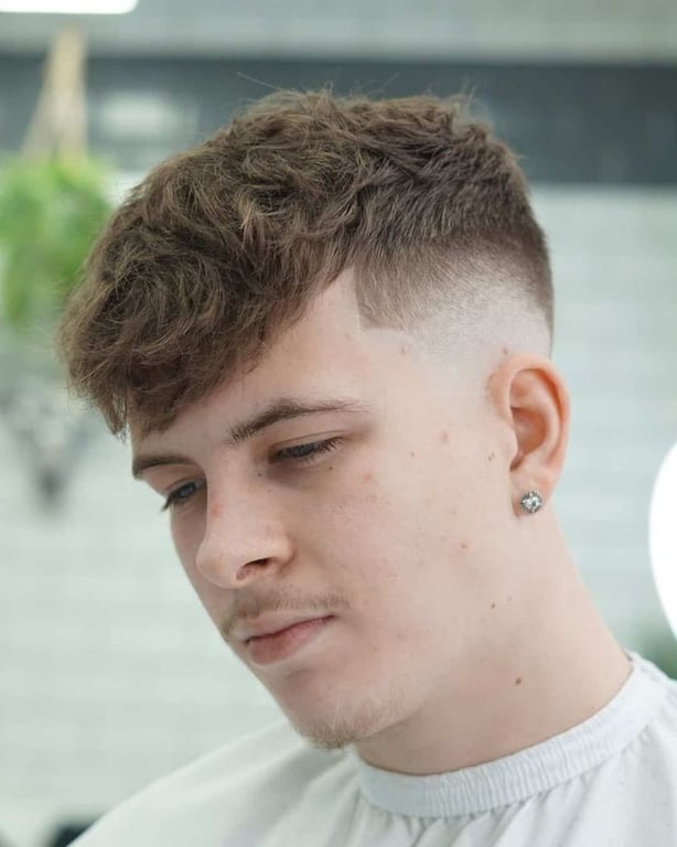 the image shows, Edgar Haircut for Wavy Hair