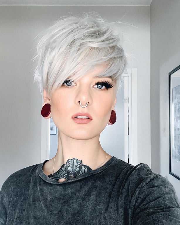 In this image show, the short cool with this blonde hair Silver Pixie Bob haircuts.