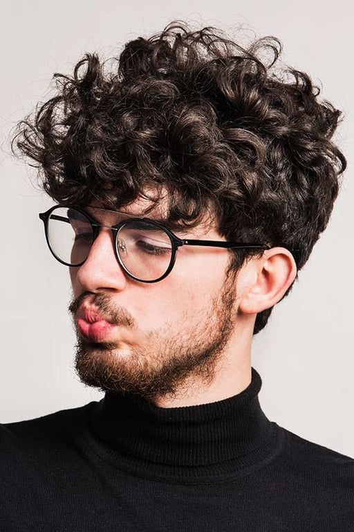 In this image show, the Curly Undercut With Extra Fringe haircuts.