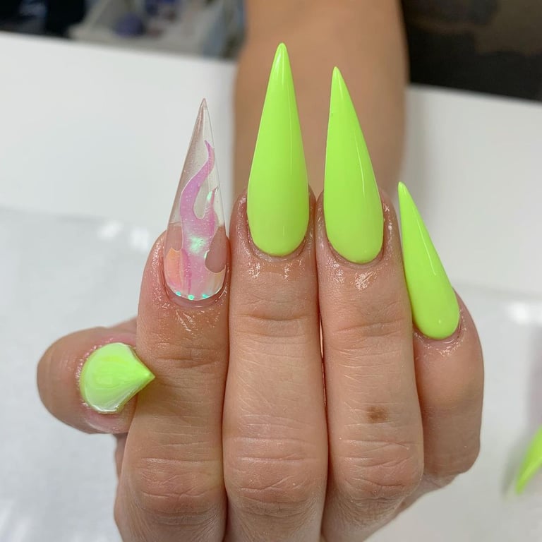 In this image show, the long cool neon color which look vibrent for this all kind of party bash nails design.