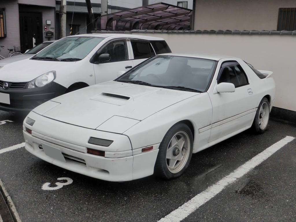 Tuned Mazda Savanna RX-7 GT-R (E-FC3S) coupe, front three-quarter view